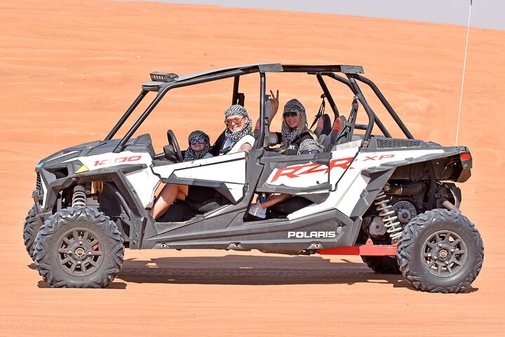 Dive into the excitement of off-roading across stunning dunes then unwind with a delicious BBQ feast under the stars surrounded by the charm of Arabian hospitality.